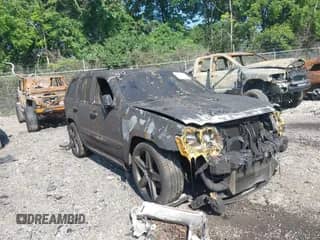 2007 Jeep Grand Cherokee SRT-8 with VIN 1J8HR78307C624494, listed as a IAAI auction lot 42719577 with 59,766 mi miles and . Bid and sale history available at DreamBid. Image 1.