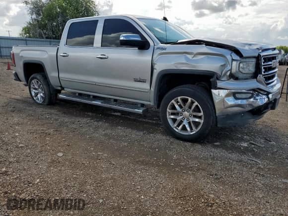 2018 GMC Sierra 1500 SLT with VIN 3GTU2NEC4JG476227, listed as a Copart auction lot 86170085 with 171,910 mi miles and Salvage title. Bid and sale history available at DreamBid. Image 4.