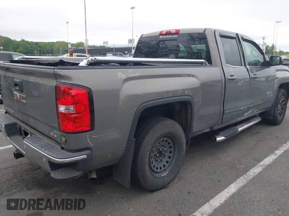 2017 GMC Sierra 1500 SLE with VIN 1GTV2MEC4HZ235499, listed as a IAAI auction lot 42247070 with 155,704 mi miles and . Bid and sale history available at DreamBid. Image 4.