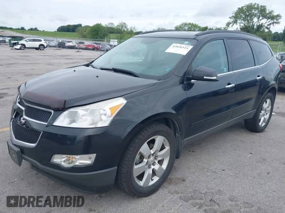 2012 Chevrolet Traverse 1LT z VIN 1GNKVGED4CJ200156, wystawiony jako IAAI lot #42826114 z przebiegiem 172 026 mil mil oraz . Historia ofert i sprzedaży dostępna na DreamBid. Obrazek 2.