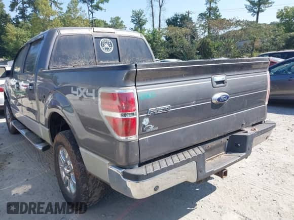 2013 Ford F-150 Lariat with VIN 1FTFW1ET5DFC93463, listed as a IAAI auction lot 43182949 with 133,397 mi miles and . Bid and sale history available at DreamBid. Image 3.