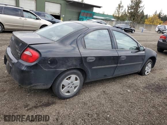2003 Dodge Neon SE with VIN 1B3ES26C63D229990, listed as a Copart auction lot 75457134 with 178,329 mi miles and Salvage title. Bid and sale history available at DreamBid. Image 3.