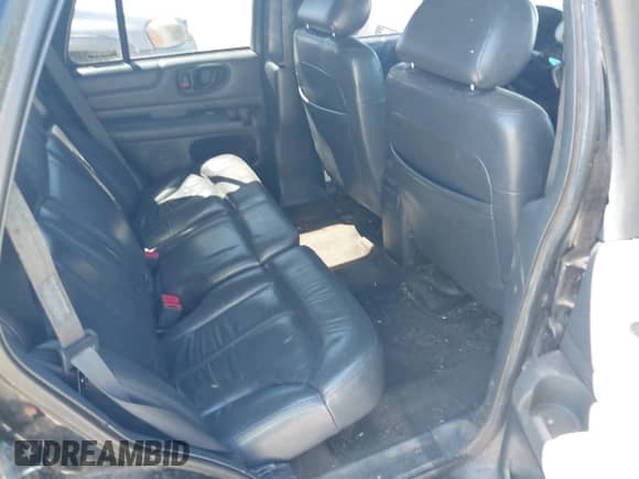 1999 Chevrolet Blazer LT z VIN 1GNDT13W1X2148856, wystawiony jako IAAI lot #42830006 z przebiegiem Nie podano mil oraz . Historia ofert i sprzedaży dostępna na DreamBid. Obrazek 8.