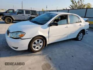 2003 Toyota Corolla LE with VIN JTDBR32E930036380, listed as a Copart auction lot 82333115 with 230,848 mi miles and Salvage title. Bid and sale history available at DreamBid. Image 1.