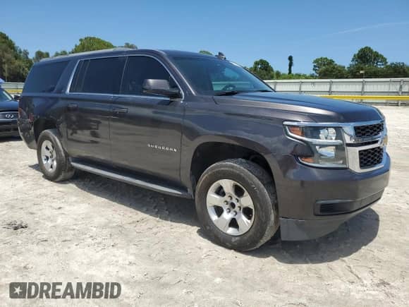 2017 Chevrolet Suburban LT with VIN 1GNSCHKC3HR280176, listed as a Copart auction lot 64605315 with 143,361 mi miles and Salvage title. Bid and sale history available at DreamBid. Image 4.