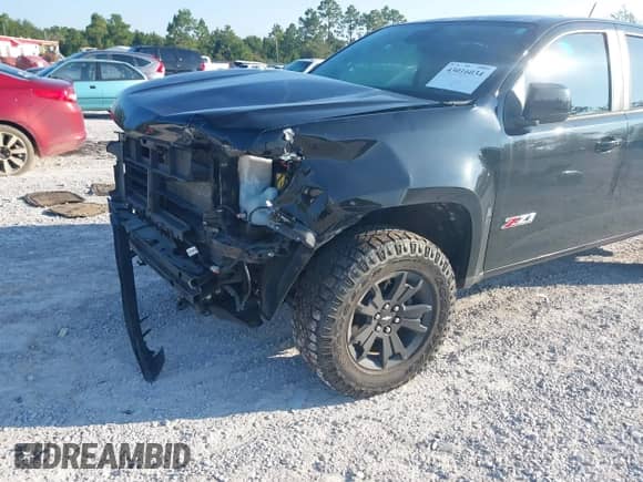 2022 Chevrolet Colorado 4WD Z71 z VIN 1GCGTDEN3N1132169, wystawiony jako IAAI lot #43016034 z przebiegiem 46 576 mil mil oraz . Historia ofert i sprzedaży dostępna na DreamBid. Obrazek 6.