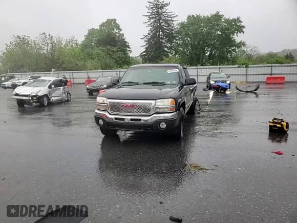 2003 GMC Sierra 1500 SLE with VIN 2GTEK19T731328981, listed as a Copart auction lot 56709645 with 242,866 mi miles and Salvage title. Bid and sale history available at DreamBid. Image 13.