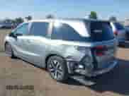 2025 Honda Odyssey EX-L with VIN 5FNRL6H61SB083582, listed as a IAAI auction lot 43262071 with 5,401 mi miles and . Bid and sale history available at DreamBid. Image 3.