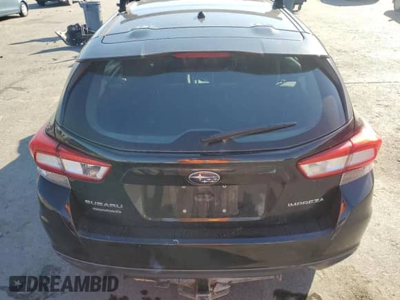 2019 Subaru Impreza with VIN 4S3GTAA68K3713115, listed as a Copart auction lot 83997305 with Not provided miles and Salvage title. Bid and sale history available at DreamBid. Image 6.