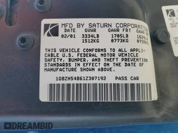 2001 Saturn SL with VIN 1G8ZH54861Z307192, listed as a Copart auction lot 58076335 with 96,157 mi miles and Salvage title. Bid and sale history available at DreamBid. Image 12.