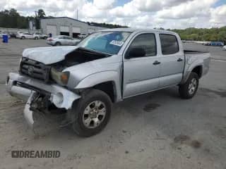 2009 Toyota Tacoma PreRunner z VIN 3TMJU62N99M090554, wystawiony jako Copart lot #82028655 z przebiegiem 295 218 mil mil oraz Szkoda całkowita • Salvage title. Historia ofert i sprzedaży dostępna na DreamBid. Obrazek 1.