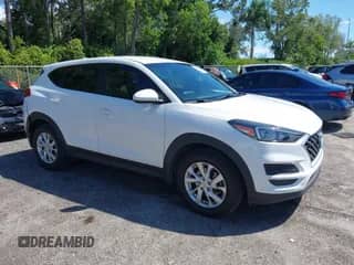2021 Hyundai Tucson SE with VIN KM8J23A41MU318897, listed as a IAAI auction lot 43233832 with 112,924 mi miles and . Bid and sale history available at DreamBid. Image 1.