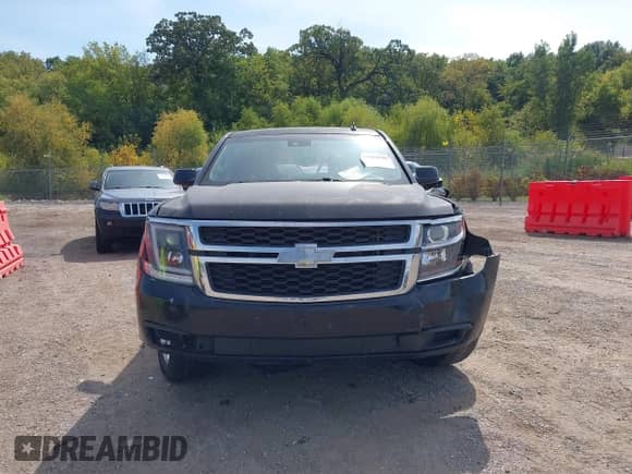 2015 Chevrolet Tahoe LT with VIN 1GNSKBKC9FR158211, listed as a IAAI auction lot 43094500 with 221,133 mi miles and . Bid and sale history available at DreamBid. Image 11.