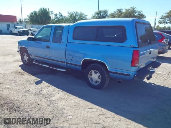 1996 GMC Sierra 1500 z VIN 2GTEC19M9T1527701, wystawiony jako IAAI lot #43289683 z przebiegiem 297 195 mil mil oraz . Historia ofert i sprzedaży dostępna na DreamBid. Obrazek 3.