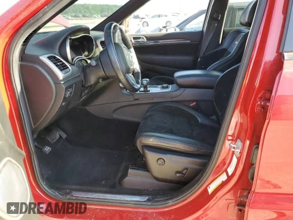 2014 Jeep Grand Cherokee SRT-8 z VIN 1C4RJFDJ6EC331312, wystawiony jako Copart lot #59111145 z przebiegiem 112 803 mil mil oraz Szkoda całkowita • Salvage title. Historia ofert i sprzedaży dostępna na DreamBid. Obrazek 7.