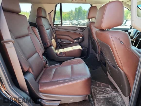 2016 Chevrolet Tahoe LTZ with VIN 1GNSKCKC8GR311975, listed as a Copart auction lot 69664515 with 129,583 mi miles and Salvage title. Bid and sale history available at DreamBid. Image 11.