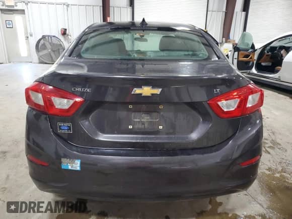 2017 Chevrolet Cruze LT с VIN 1G1BE5SM7H7131865, выставлен на аукционе Copart как лот 85877425 с пробегом 144 207 миль миль и Списание • Salvage title. История ставок и продаж доступна на DreamBid. Изображение 6.