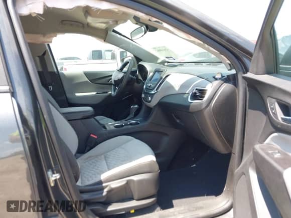 2021 Chevrolet Equinox LS z VIN 2GNAXHEV6M6150900, wystawiony jako IAAI lot #43068062 z przebiegiem 63 704 mil mil oraz . Historia ofert i sprzedaży dostępna na DreamBid. Obrazek 5.