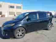 2015 Toyota Sienna SE with VIN 5TDXK3DC4FS583841, listed as a IAAI auction lot 41223820 with 190,117 mi miles and . Bid and sale history available at DreamBid. Image 2.