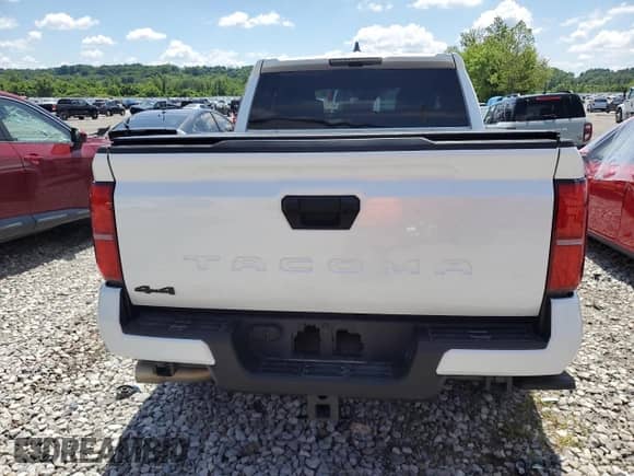 2024 Toyota Tacoma SR5 with VIN 3TYLB5JN5RT024582, listed as a Copart auction lot 58775645 with 20,130 mi miles and Salvage title. Bid and sale history available at DreamBid. Image 6.