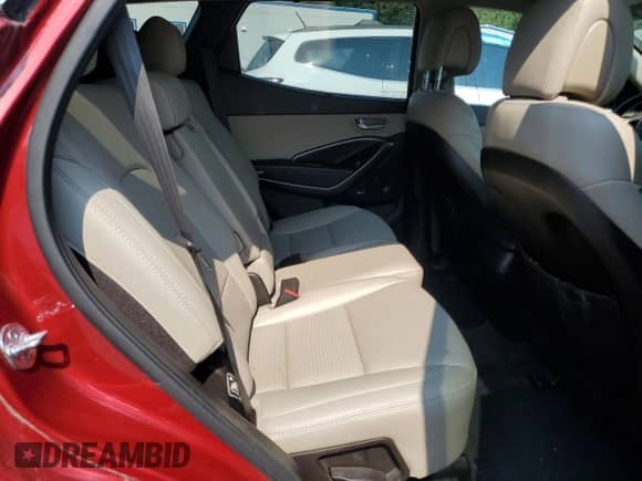 2014 Hyundai Santa Fe z VIN 5XYZUDLA4EG224106, wystawiony jako Copart lot #71776945 z przebiegiem 95 362 mil mil oraz Czysty tytuł • Clean title. Historia ofert i sprzedaży dostępna na DreamBid. Obrazek 11.