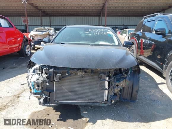 2022 Toyota Camry Hybrid LE with VIN 4T1C31AK9NU592164, listed as a IAAI auction lot 43394960 with 56,727 mi miles and . Bid and sale history available at DreamBid. Image 13.