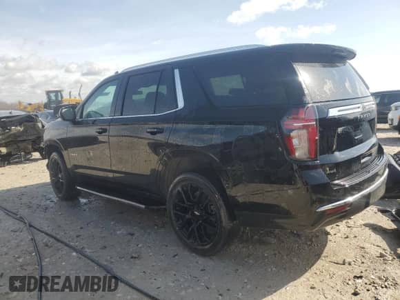2023 Chevrolet Tahoe LS z VIN 1GNSKMKD9PR107491, wystawiony jako Copart lot #51268465 z przebiegiem 52 053 mil mil oraz Szkoda całkowita • Salvage title. Historia ofert i sprzedaży dostępna na DreamBid. Obrazek 2.