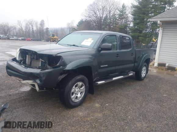2010 Toyota Tacoma with VIN 5TEMU4FN9AZ673418, listed as a IAAI auction lot 42001308 with 127,453 mi miles and . Bid and sale history available at DreamBid. Image 2.