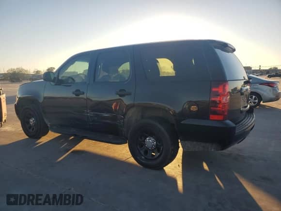 2011 Chevrolet Tahoe Commercial z VIN 1GNLC2E08BR139033, wystawiony jako Copart lot #79742124 z przebiegiem 186 858 mil mil oraz Szkoda całkowita • Salvage title. Historia ofert i sprzedaży dostępna na DreamBid. Obrazek 2.