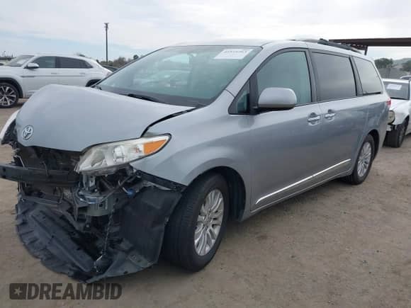 2013 Toyota Sienna XLE AAS with VIN 5TDYK3DCXDS312672, listed as a IAAI auction lot 41521263 with 183,707 mi miles and . Bid and sale history available at DreamBid. Image 2.