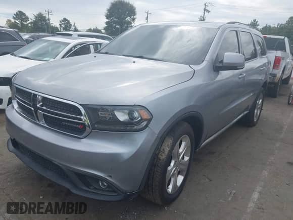 2014 Dodge Durango Limited with VIN 1C4SDJDT0EC306967, listed as a IAAI auction lot 43414904 with 219,169 mi miles and . Bid and sale history available at DreamBid. Image 2.