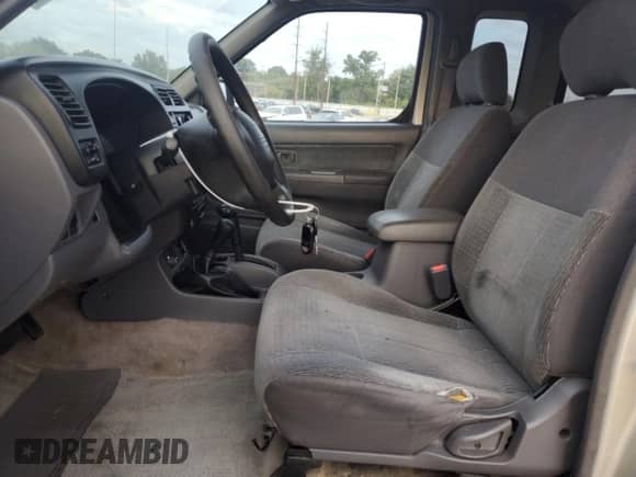 1999 Nissan Frontier XE с VIN 1N6ED26Y7XC302121, выставлен на аукционе Copart как лот 80809765 с пробегом 196 908 миль миль и На запчасти • Non repairable. История ставок и продаж доступна на DreamBid. Изображение 7.