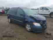 2002 Dodge Caravan with VIN 1B4GP25R12B704306, listed as a Copart auction lot 57871685 with 181,234 mi miles and Salvage title. Bid and sale history available at DreamBid. Image 4.
