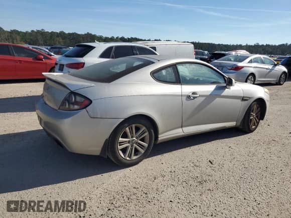 2008 Hyundai Tiburon GS с VIN KMHHM66D38U286530, выставлен на аукционе Copart как лот 80779474 с пробегом 258 212 миль миль и Списание • Salvage title. История ставок и продаж доступна на DreamBid. Изображение 3.