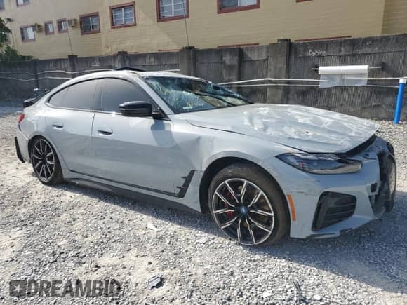 2024 BMW i4 eDrive40 with VIN WBY73AW05RFT21513, listed as a Copart auction lot 66119785 with 15,130 mi miles and Salvage title. Bid and sale history available at DreamBid. Image 4.