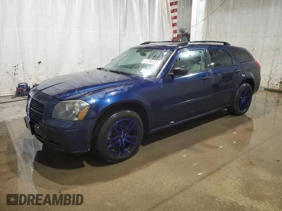 2005 Dodge Magnum SXT with VIN 2D4GZ48V95H537435, listed as a Copart auction lot 74198134 with 84,164 mi miles and Salvage title. Bid and sale history available at DreamBid. Image 1.