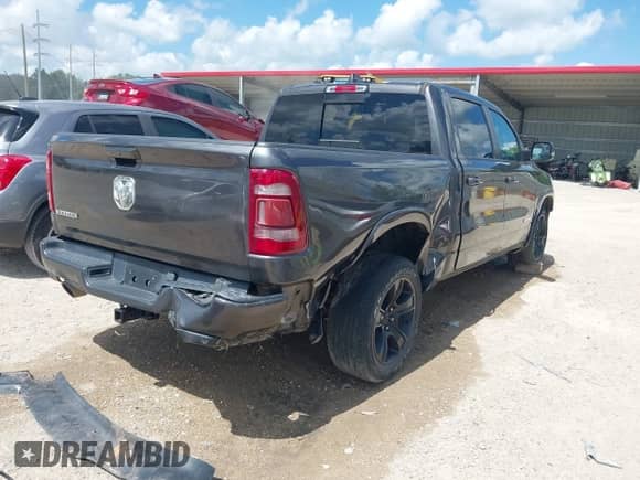 2019 Ram 1500 Laramie with VIN 1C6RREJT9KN740596, listed as a IAAI auction lot 42569812 with 60,265 mi miles and . Bid and sale history available at DreamBid. Image 4.