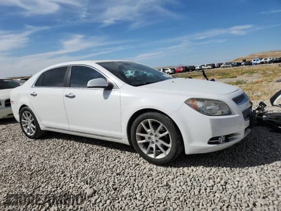 2012 Chevrolet Malibu LTZ 1LZ with VIN 1G1ZE5E03CF374398, listed as a Copart auction lot 81307125 with 149,173 mi miles and Salvage title. Bid and sale history available at DreamBid. Image 4.