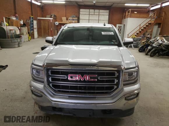 2018 GMC Sierra 1500 SLE с VIN 1GTV2MEC1JZ245395, выставлен на аукционе Copart как лот 70380975 с пробегом 89 845 миль миль и Списание • Salvage title. История ставок и продаж доступна на DreamBid. Изображение 5.