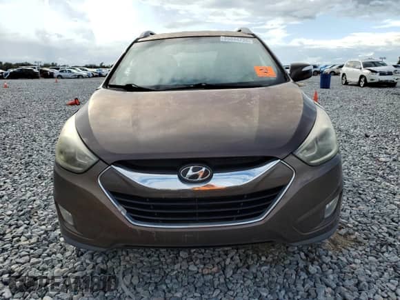2015 Hyundai Tucson SE z VIN KM8JU3AG3FU989138, wystawiony jako Copart lot #85844735 z przebiegiem 131 721 mil mil oraz Szkoda całkowita • Salvage title. Historia ofert i sprzedaży dostępna na DreamBid. Obrazek 5.