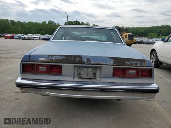 1983 Chevrolet Impala with VIN 2G1AL69H4D1166273, listed as a Copart auction lot 56203825 with 63,556 mi miles and Salvage title. Bid and sale history available at DreamBid. Image 6.