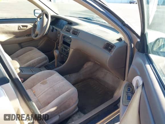 1998 Toyota Camry LE with VIN JT2BG22K3W0151088, listed as a IAAI auction lot 41429977 with 435,394 mi miles and . Bid and sale history available at DreamBid. Image 5.