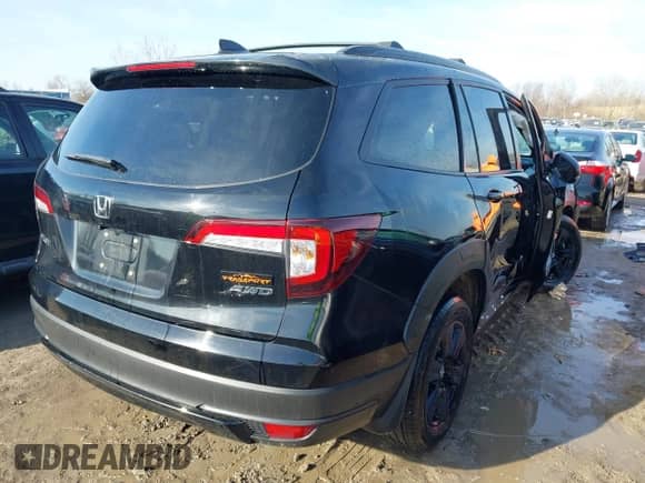 2022 Honda Pilot TrailSport with VIN 5FNYF6H8XNB085971, listed as a IAAI auction lot 41797773 with 55,095 mi miles and . Bid and sale history available at DreamBid. Image 4.