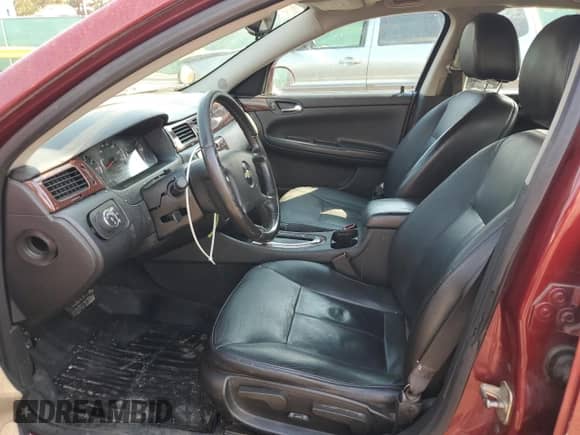 2009 Chevrolet Impala LT with VIN 2G1WC57M891165537, listed as a Copart auction lot 68560145 with 287,387 mi miles and Salvage title. Bid and sale history available at DreamBid. Image 7.