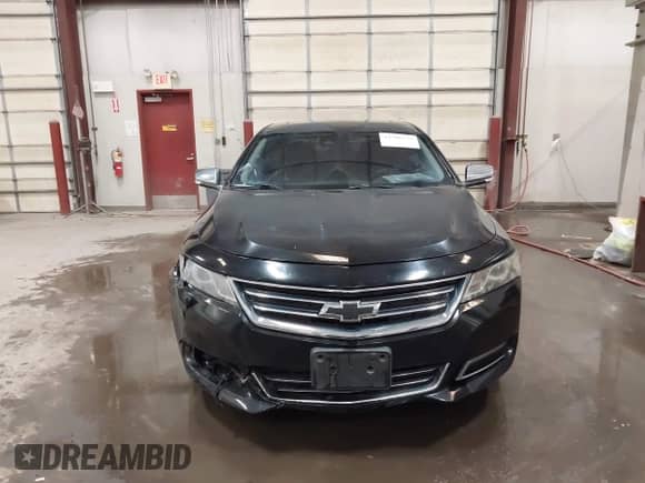 2014 Chevrolet Impala LTZ with VIN 1G1145SLXEU149313, listed as a IAAI auction lot 42386535 with 153,304 mi miles and . Bid and sale history available at DreamBid. Image 12.