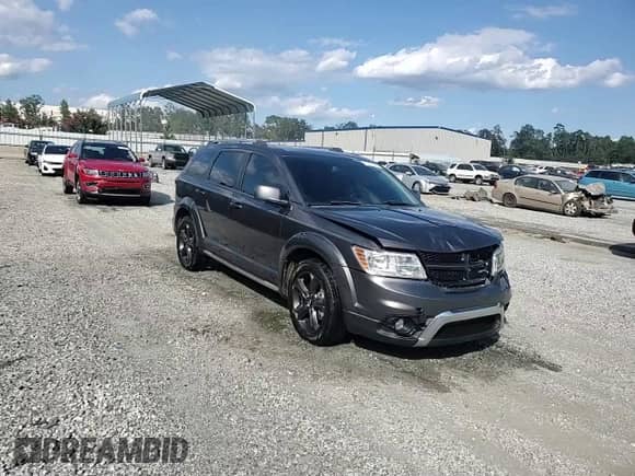 2018 Dodge Journey Crossroad z VIN 3C4PDCGB9JT229390, wystawiony jako Copart lot #70701625 z przebiegiem 75 648 mil mil oraz Szkoda całkowita • Salvage title. Historia ofert i sprzedaży dostępna na DreamBid. Obrazek 13.