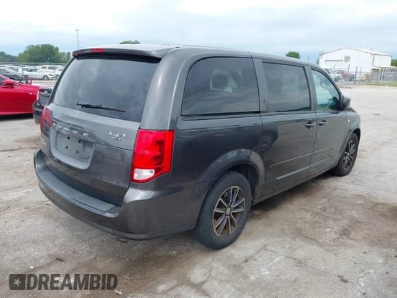 2014 Dodge Grand Caravan SE with VIN 2C4RDGBG7ER361821, listed as a IAAI auction lot 42919043 with 211,735 mi miles and . Bid and sale history available at DreamBid. Image 4.