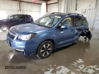 2018 Subaru Forester Premium with VIN JF2SJAGC0JH527987, listed as a Copart auction lot 82648695 with 78,732 mi miles and Salvage title. Bid and sale history available at DreamBid. Image 1.