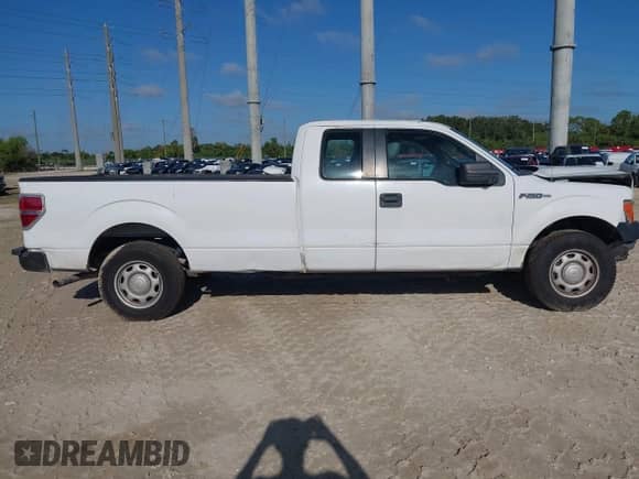 2014 Ford F-150 STX with VIN 1FTFX1CF5EKD93744, listed as a IAAI auction lot 43280853 with 144,024 mi miles and . Bid and sale history available at DreamBid. Image 13.