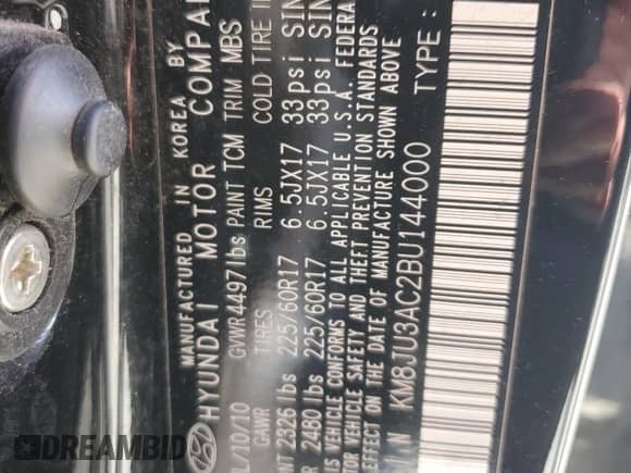 2011 Hyundai Tucson Limited z VIN KM8JU3AC2BU144000, wystawiony jako Copart lot #61812884 z przebiegiem 104 047 mil mil oraz Szkoda całkowita • Salvage title. Historia ofert i sprzedaży dostępna na DreamBid. Obrazek 13.